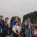 Actors on a stage in a park
